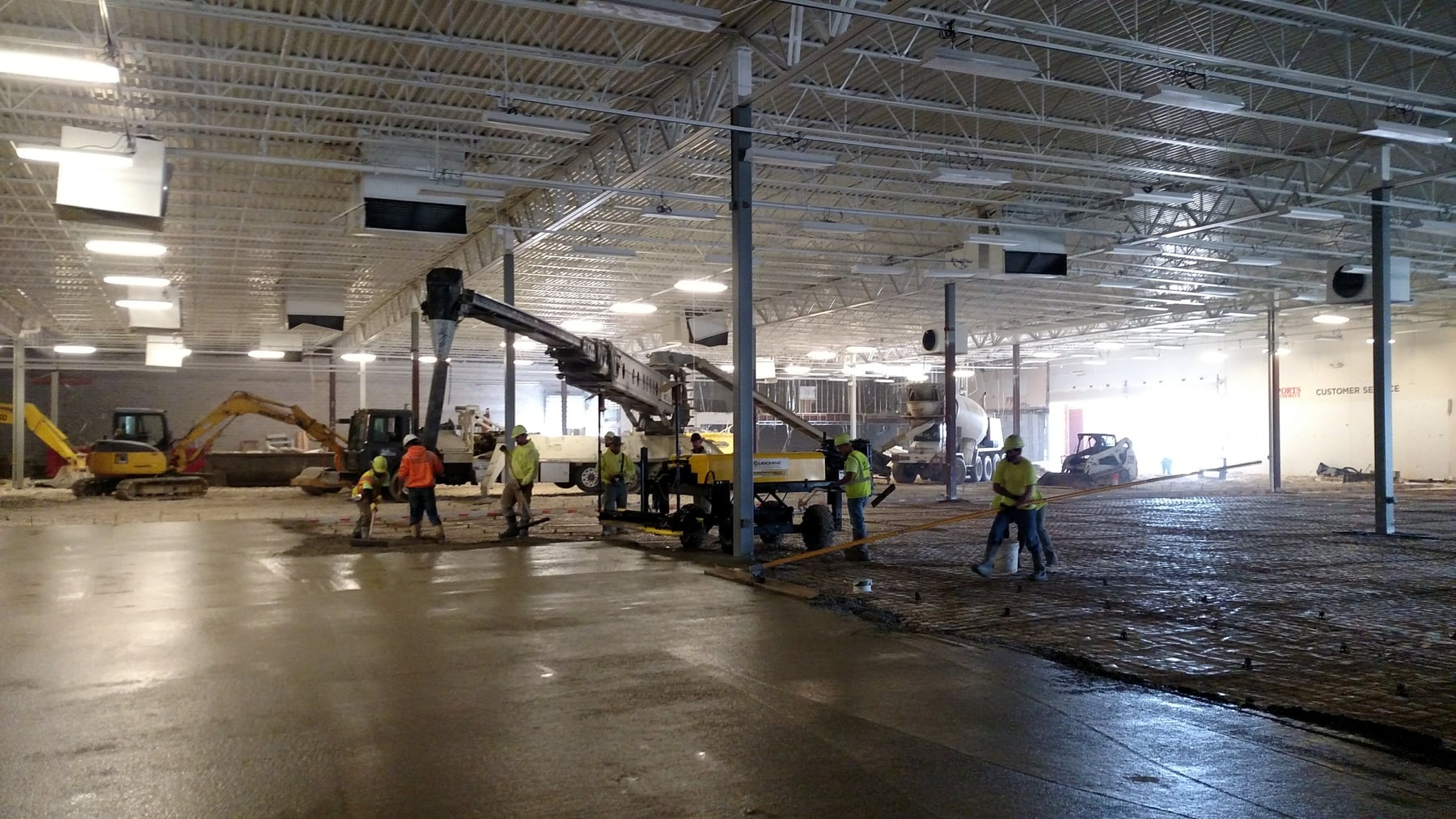 Upmost Cement placing a large commercial concrete floor